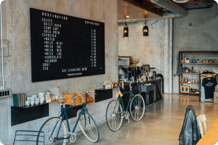 Picture of bikes against a wall in a restaurant.